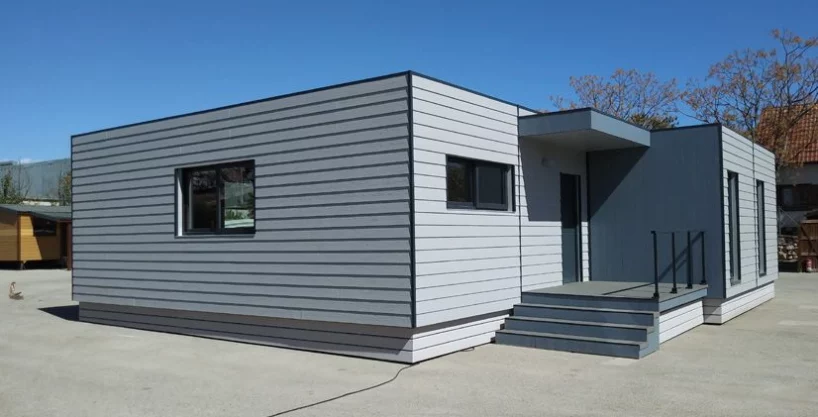 Casa modular moderna cúbica Lara con revestimiento en Cedral Lap Wood