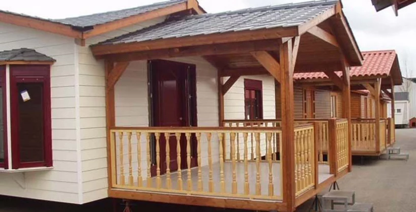 casa de madera Hercules de Casas Carbonell con fachada de Cedral Clasic Wood color blanco